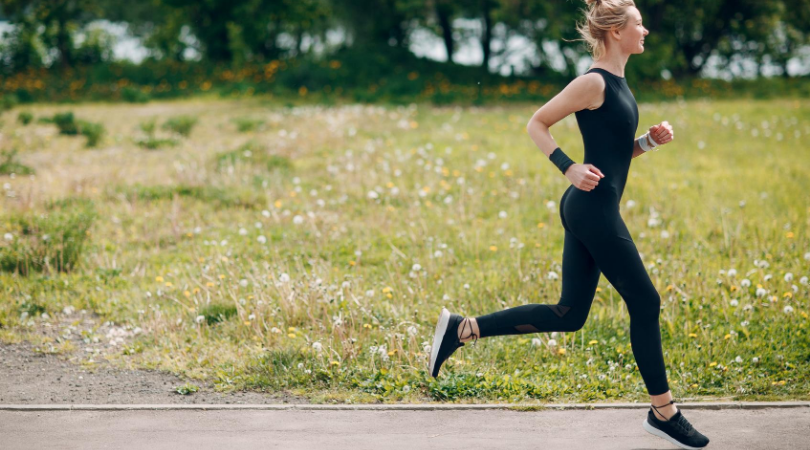 Female runner running outside