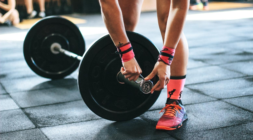 Runner in the gym strengthening