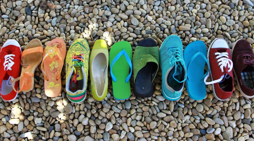 picture of multiple different shoes lined up 