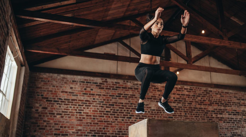 runner doing box jumps to help achilles pain