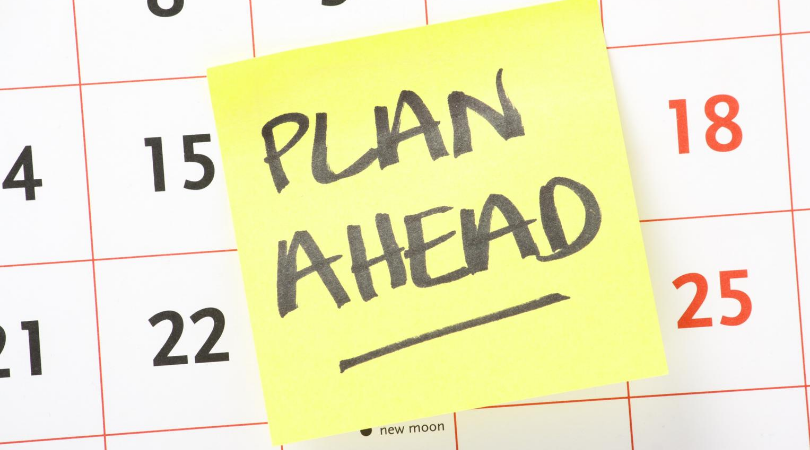 Planning schedule with a post it note plan ahead