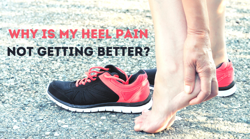 runner holding heel in pain 